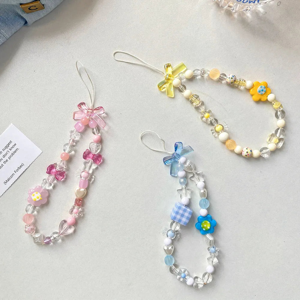 Plastic resin beaded mobile phone lanyard with flower beads in yellow