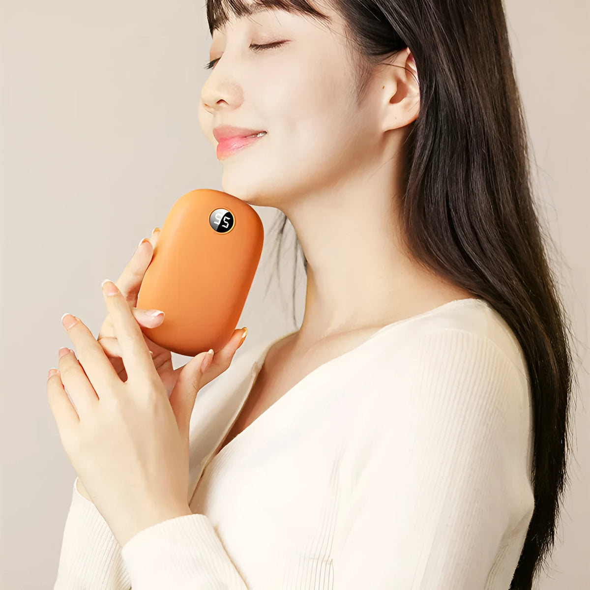 Portable two-in-one hand warmer and USB power bank, model H2, 11.5x7x2.6cm, in Milky White, Peach Pink or Warm Orange