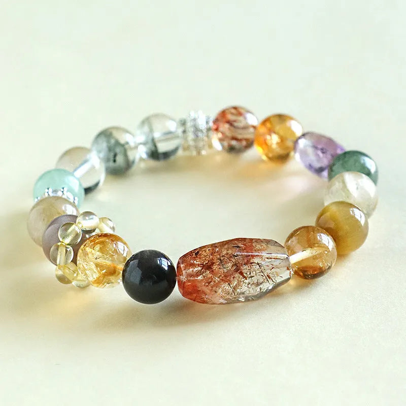 Handmade black and gold string bead bracelet made with natural Duobao crystal.