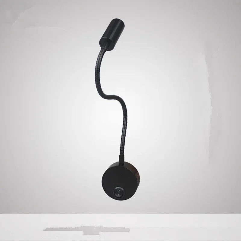 Black 1W LED ceiling painting spotlight with aluminium finish on white ceiling showing 360-degree rotation
