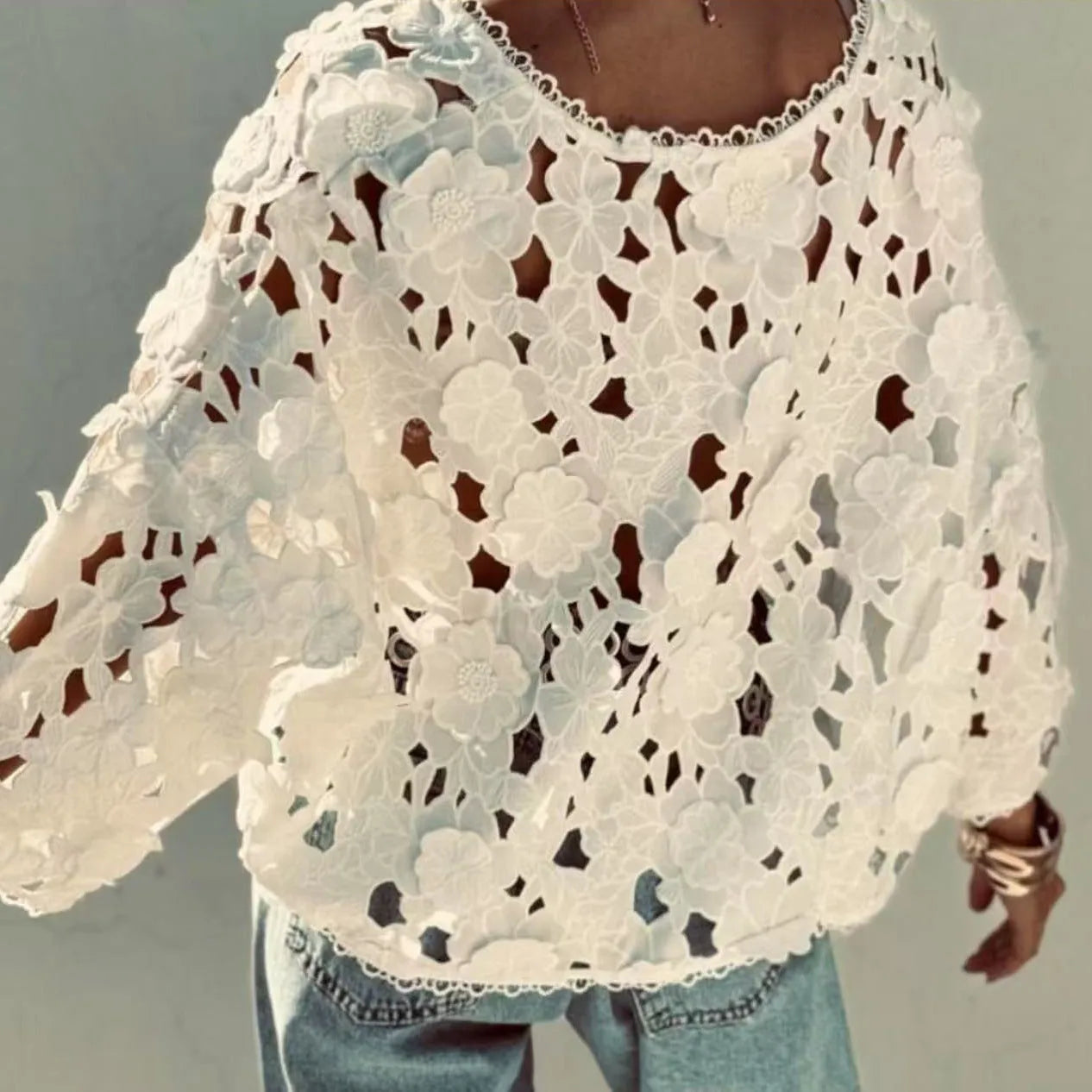 Women's loose fit black lace V-neck cardigan shirt featuring a three-dimensional white lace flower decoration on the chest.