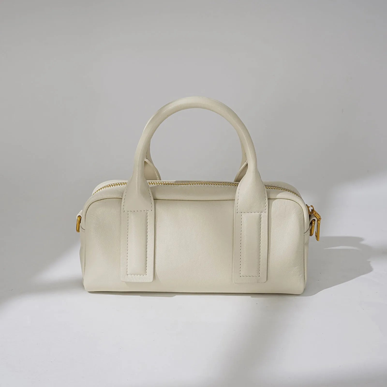 Soft first layer cowhide genuine leather crossbody handbag in brown with sewing line detail and sandwich pocket