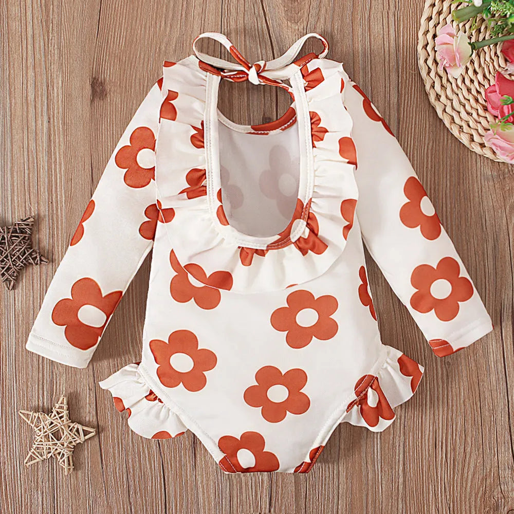 Girl's pattern graphic print crew neck open back swimsuit in orange red with flower design, polyester fabric