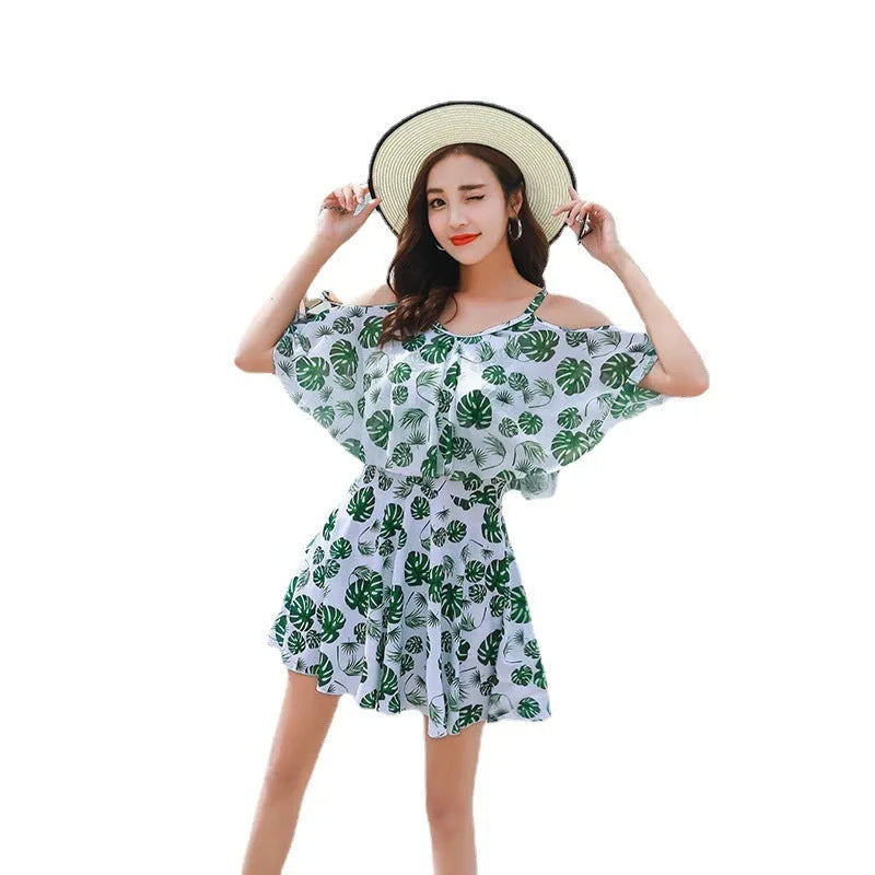 Women's printed one-piece swimsuit in polyester fabric showing green leaf style and black letter style colour options