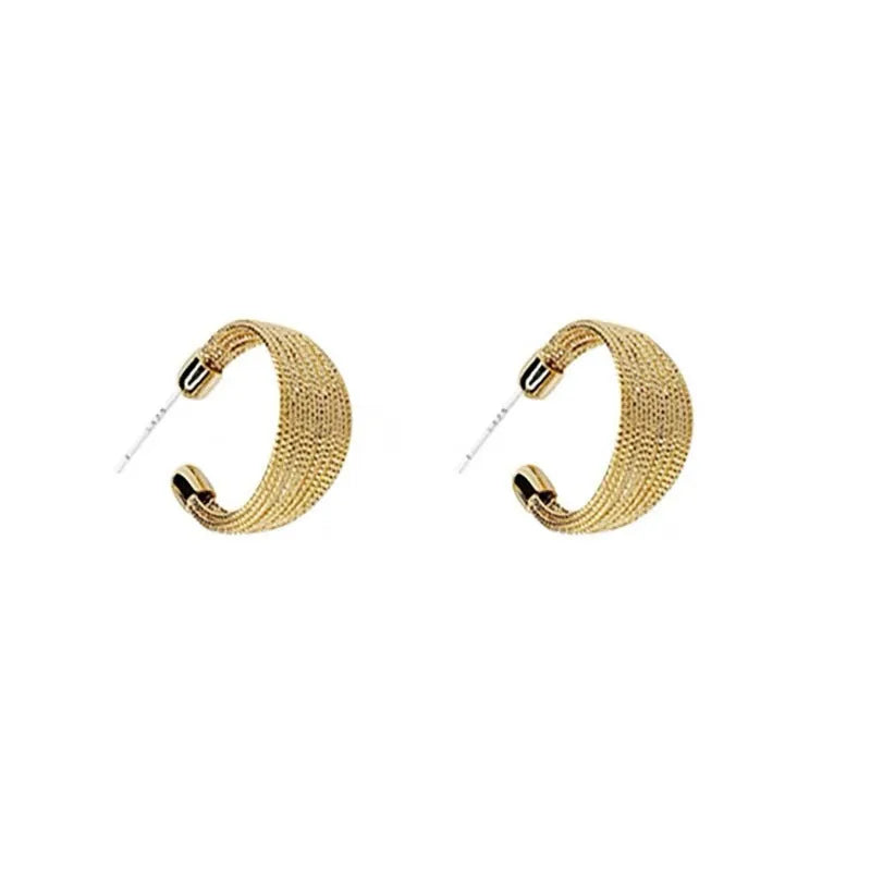 Geometric copper earrings with electroplated gold or silver finish showing stud and clip style options