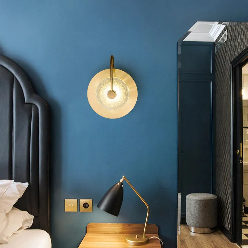 Modern simplicity wall lamp with clear glass shade for background lighting on a wall