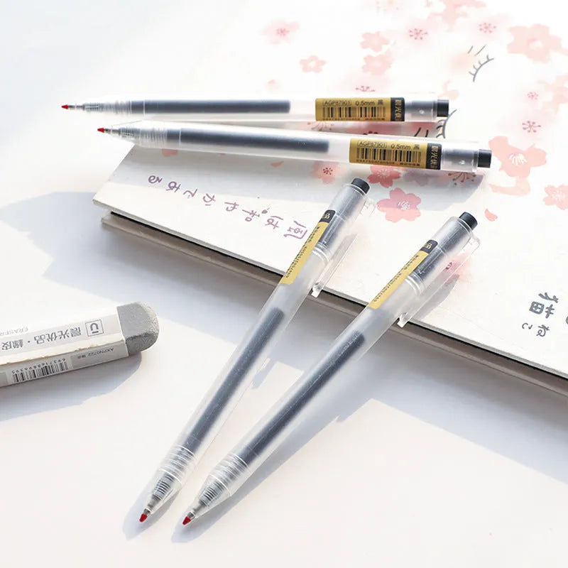12 black frosted stick gel pens with retractable tips and 2 refills