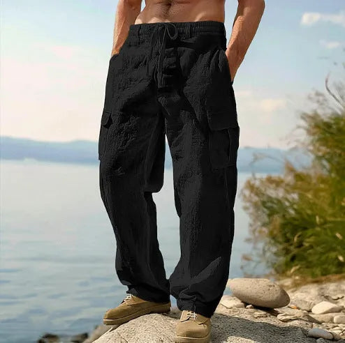 Men's cotton wide-leg casual trousers in light army green colour showing loose fit and mid waist design