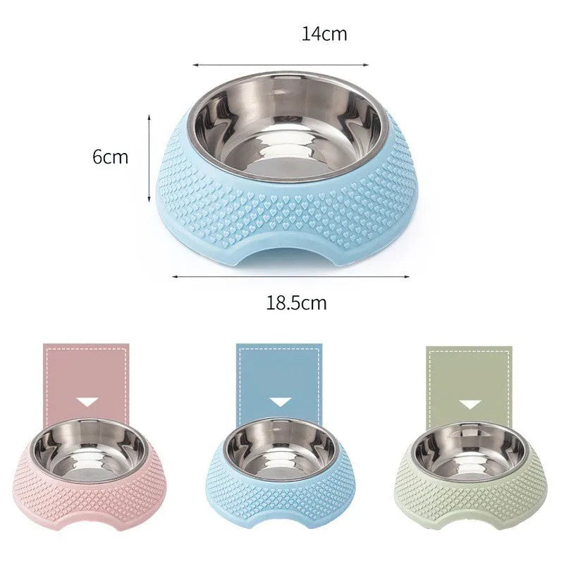 Blue stainless steel pet bowl with non-slip base on a floor.