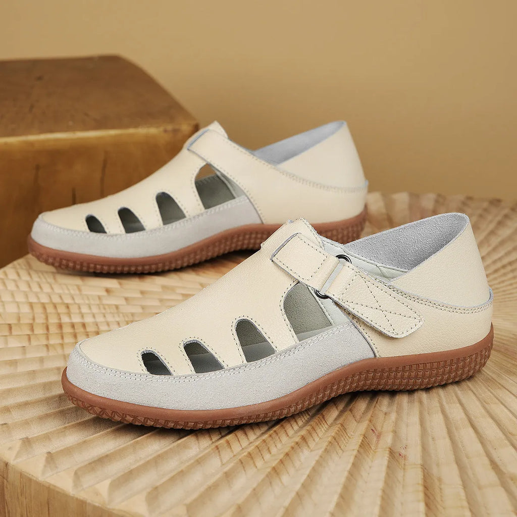 Women's plus size flat heel sandals with hollow breathable design and toe cap in blue colour