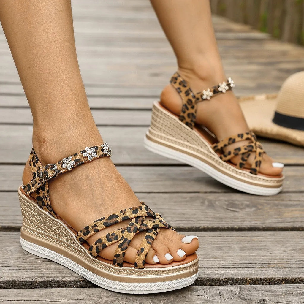 Light brown suede women's platform sandals with ankle buckle and open toe on a white background.