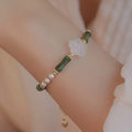 Chinese style olivine bamboo joint bracelet with Hetian jade beads and copper shell pearls