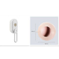 Porcelain White 3-in-1 Electric Steam Pet Brush with silicone bristles and USB charging port