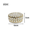 French gold iron frame transparent crystal glass jewelry storage box on a table