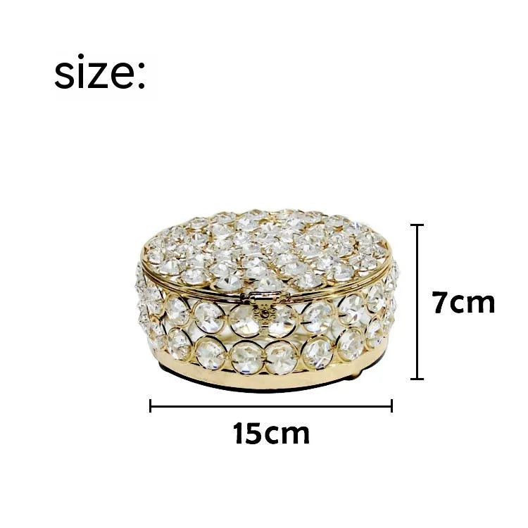 French gold iron frame transparent crystal glass jewelry storage box on a table