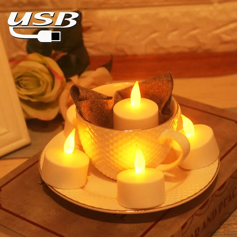 White plastic USB rechargeable LED candle lamp with flame-shaped head on plastic cup