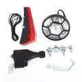 Silver bicycle dynamo-powered generator light kit for mounting on frame, showing wiring connectors.
