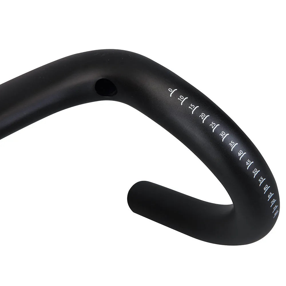 Black carbon fibre bicycle handlebar showing bent shape, with 31.8mm clamp area.
