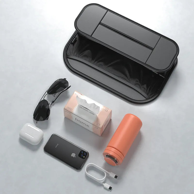 Black leather car seat rear storage bag showing compartments and dimensions