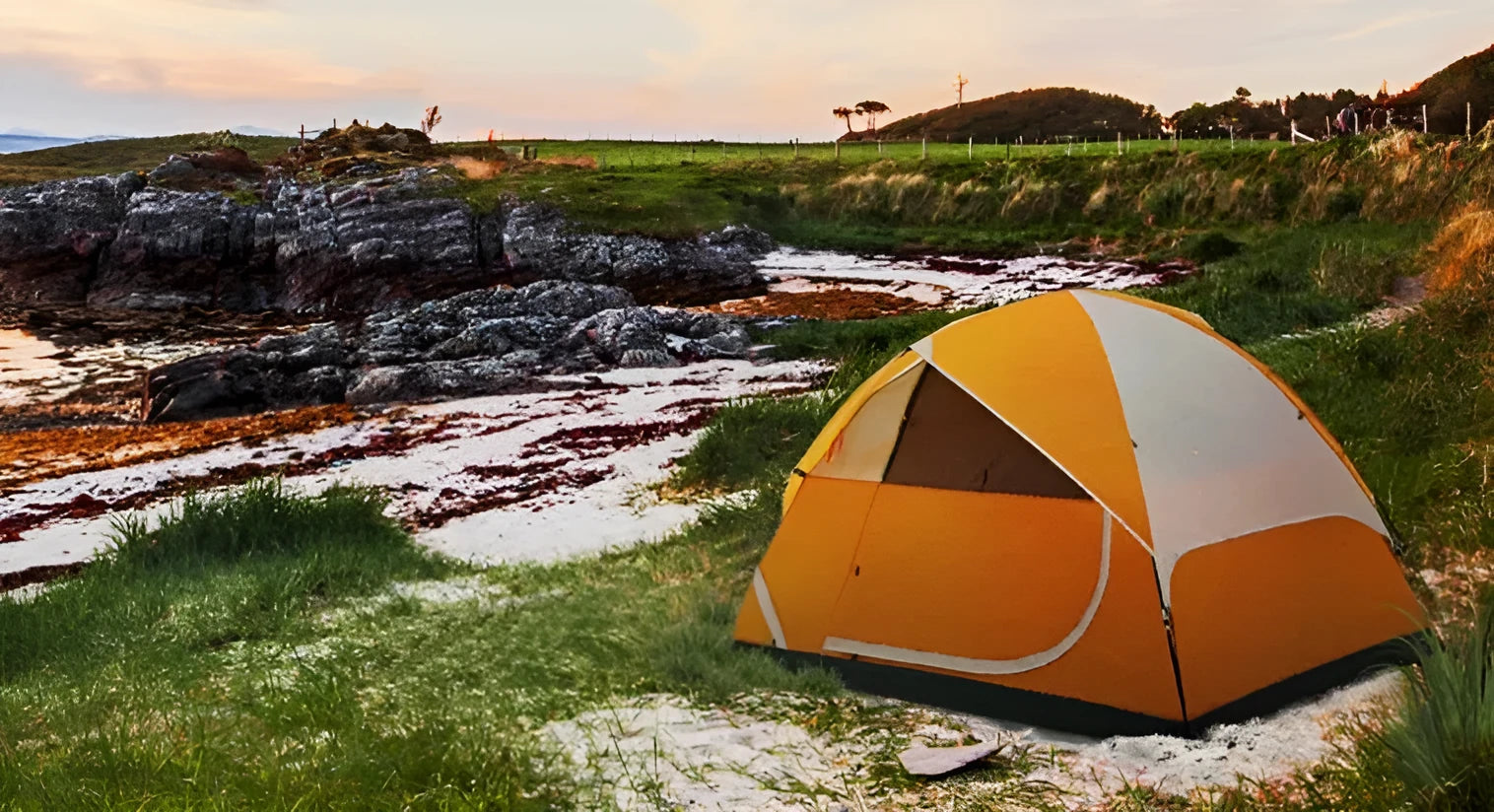 Orange portable camping tent for 2 persons set up outdoors with fibreglass poles and 190T B3 grid fabric