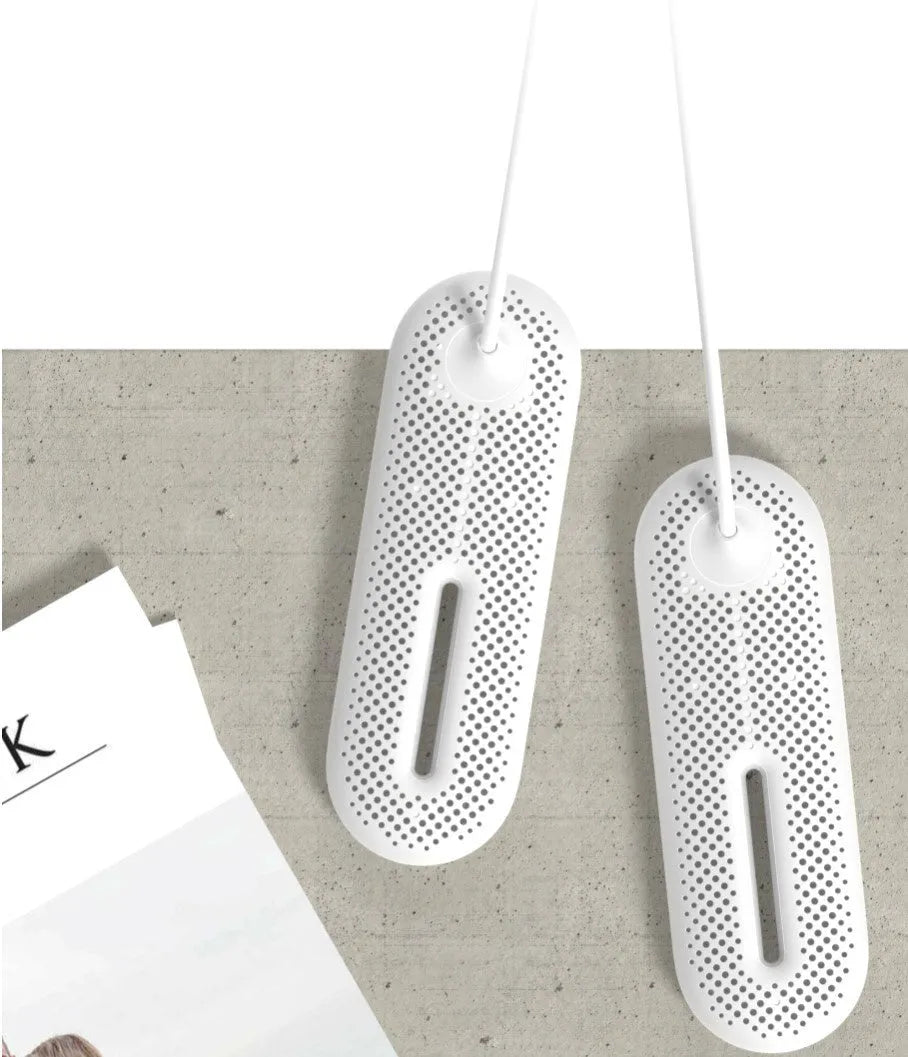 White USB shoe dryer with 360-degree three-dimensional drying for winter footwear