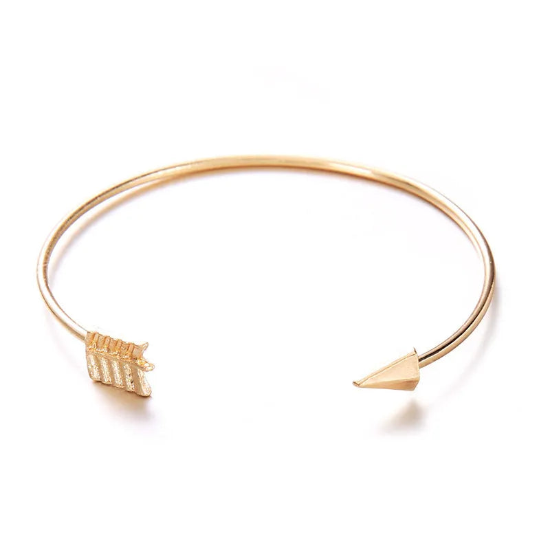 Gold vintage arrow knotted cuff bracelet for women with electroplated alloy construction