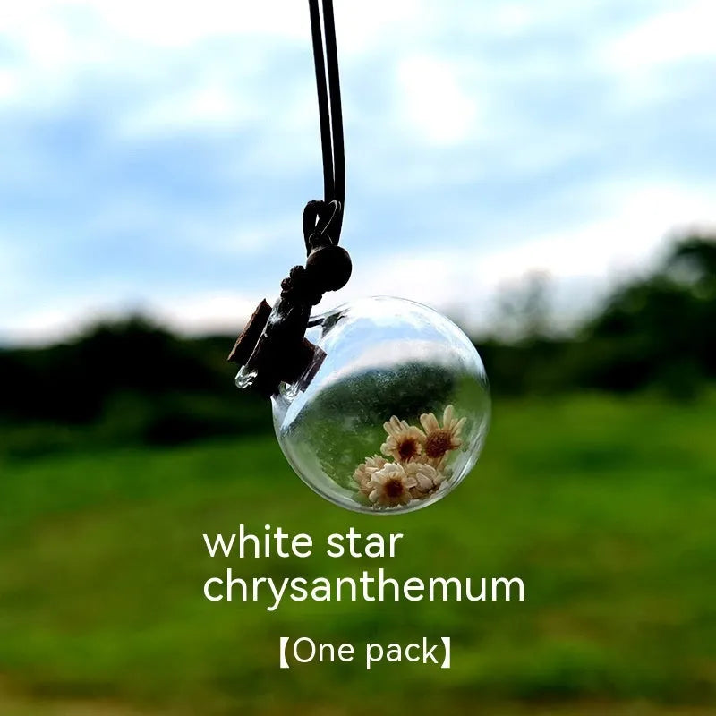 Glass car perfume pendant with preserved flowers for interior decoration and air freshening
