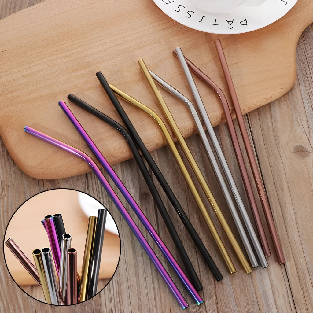 Set of four colourful reusable stainless steel straws in straight and bent styles with a cleaning brush.