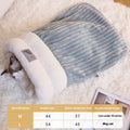 Brown semi-enclosed plush pet sleeping bag or cat nest bed on a wooden floor.
