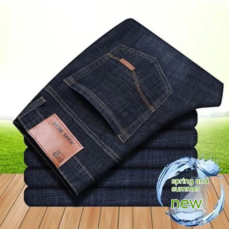 Elastic men's straight tube loose casual jeans in denim, blue colour, side view showing straight leg and waistband