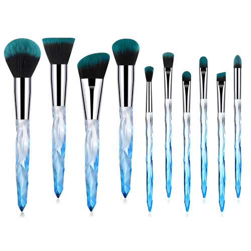 Set of ten clear crystal handle makeup brushes with diamond shank detail and artificial fibre bristles.