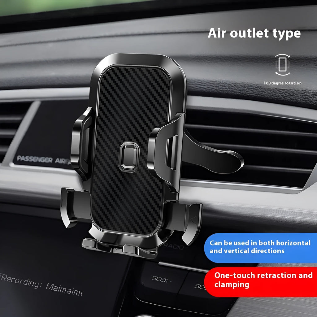 Black plastic manual car phone holder clipped to a vehicle air outlet vent