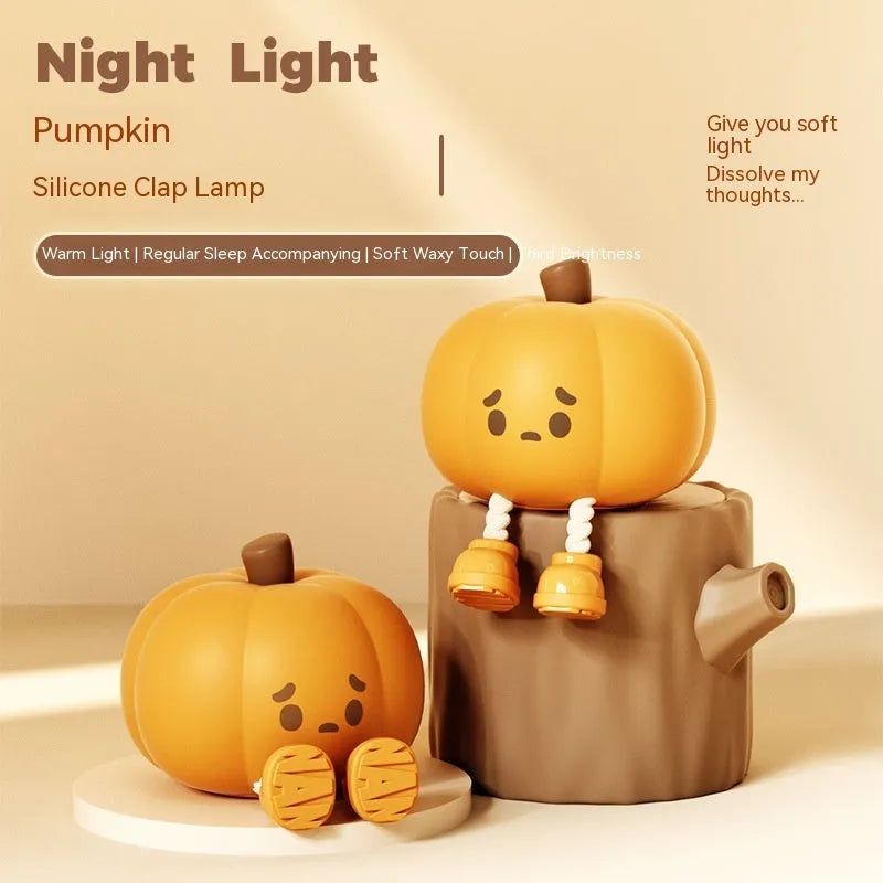 Soft silicone pumpkin-shaped night light with orange colour and touch dimming controls