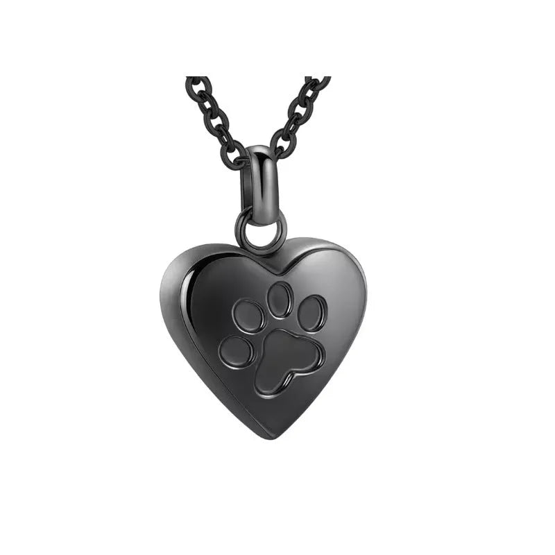 Polished titanium steel heart pendant with paw print, an openable casket necklace for cremation ashes.