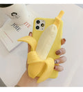 Unzip banana silicone phone case in bright yellow for iPhone, showing realistic unzip detail and soft TPU back protector