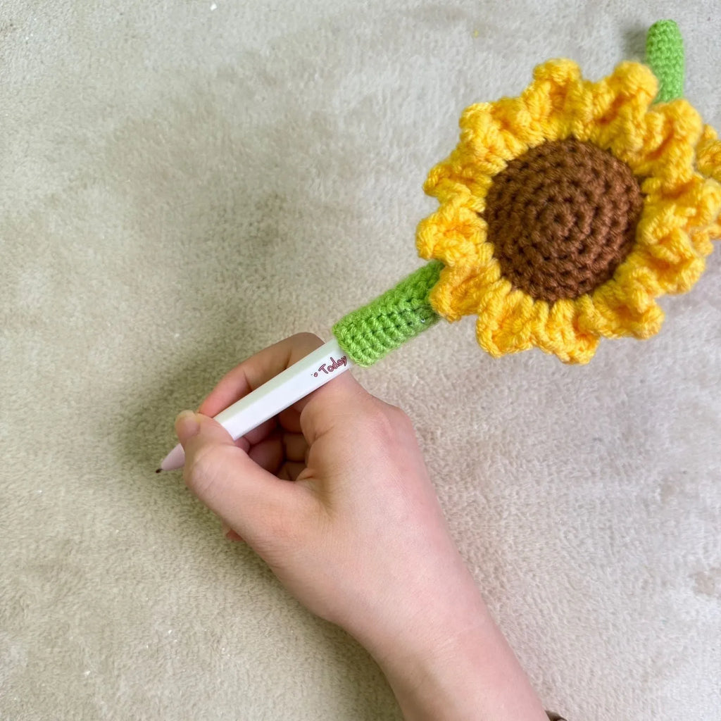 Hand-woven sunflower design jute pen cover, a natural fibre pen holder.