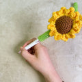 Hand-woven sunflower design jute pen cover, a natural fibre pen holder.