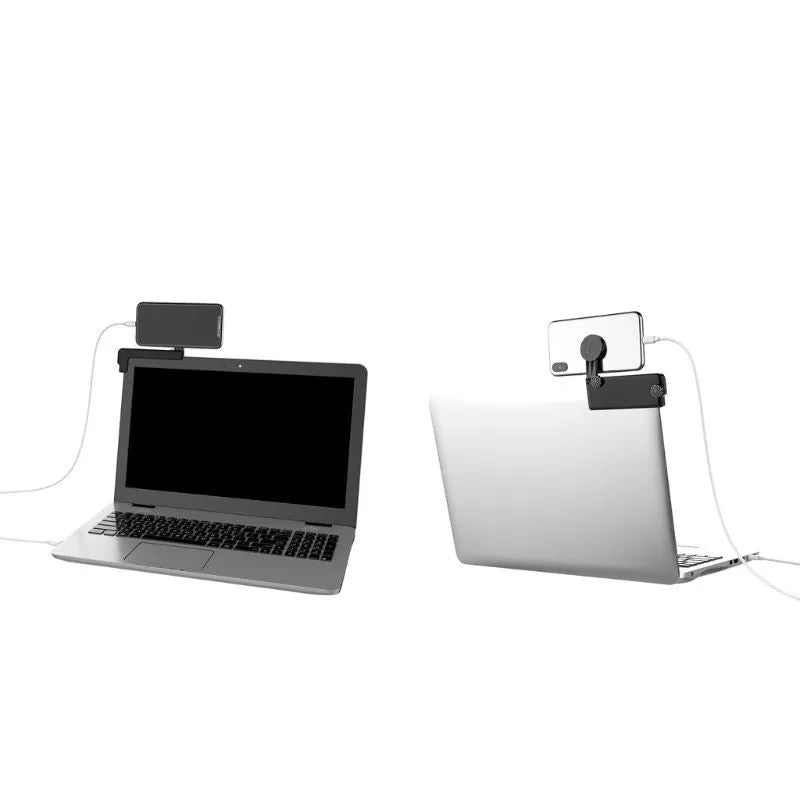 Black silicone computer side screen clip phone holder attached to a laptop, with a smartphone held magnetically