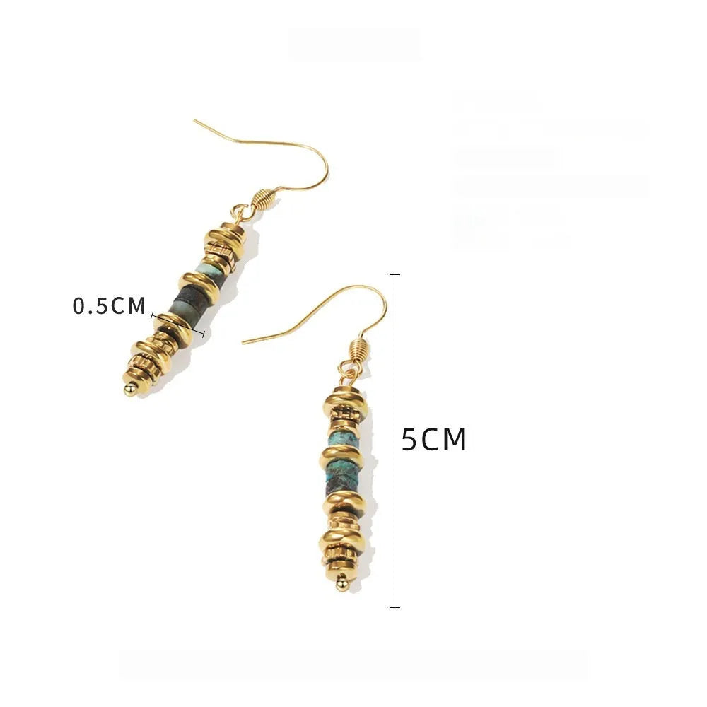 Titanium steel geometric dangle earrings in a retro style with an 18K plated finish.