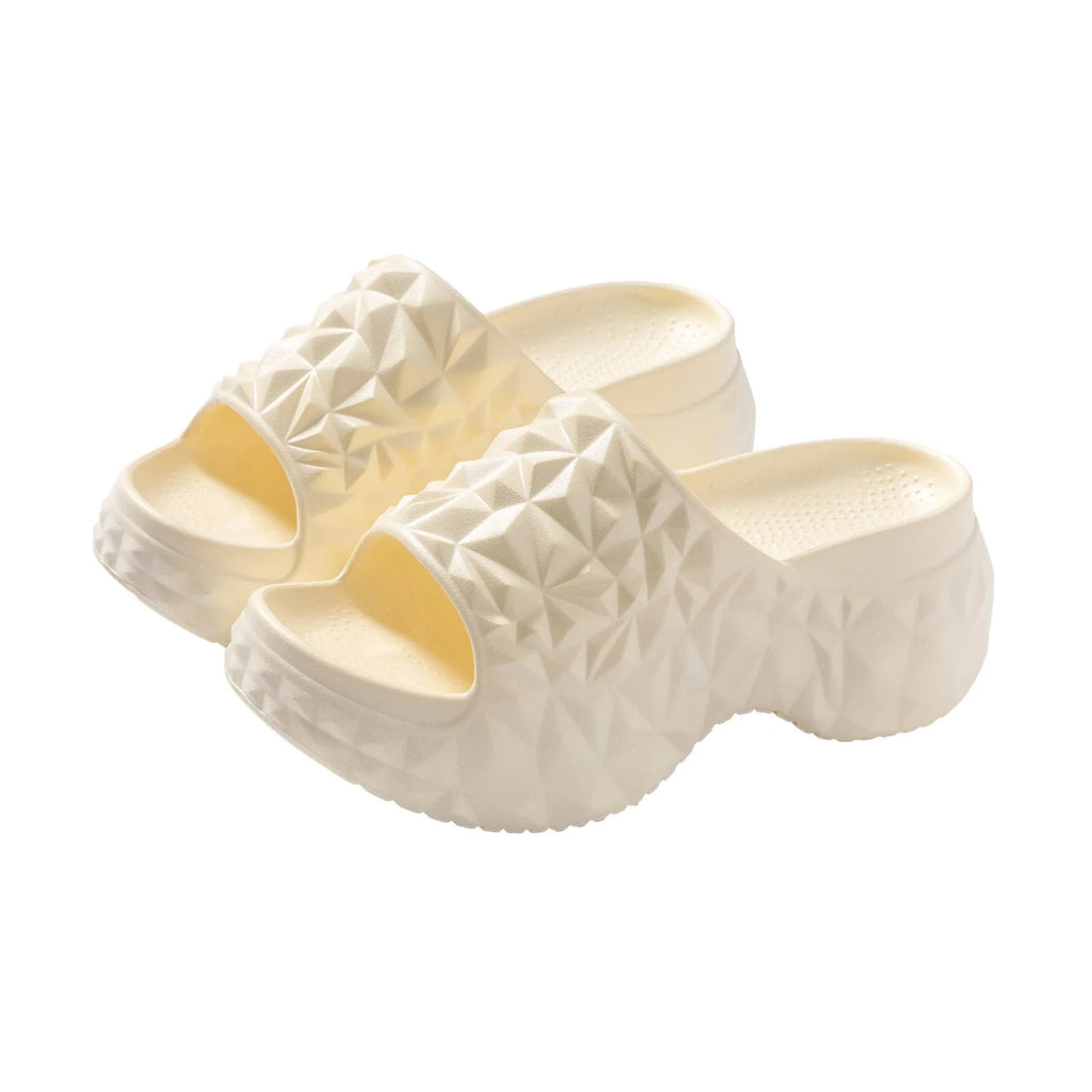 Khaki coloured EVA high heel flip flop slippers with a thick, textured sole.