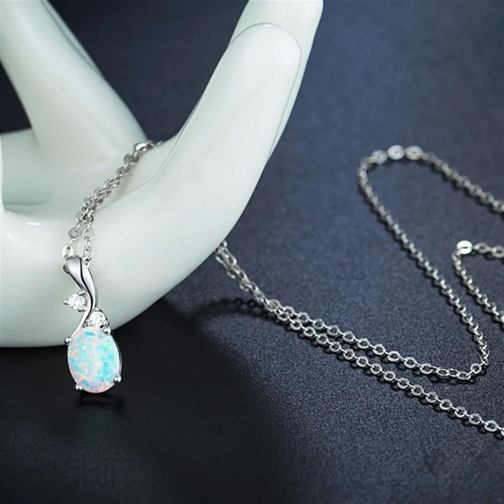 Water drop shaped opal pendant necklace on adjustable O-shaped chain in rose gold electroplated finish