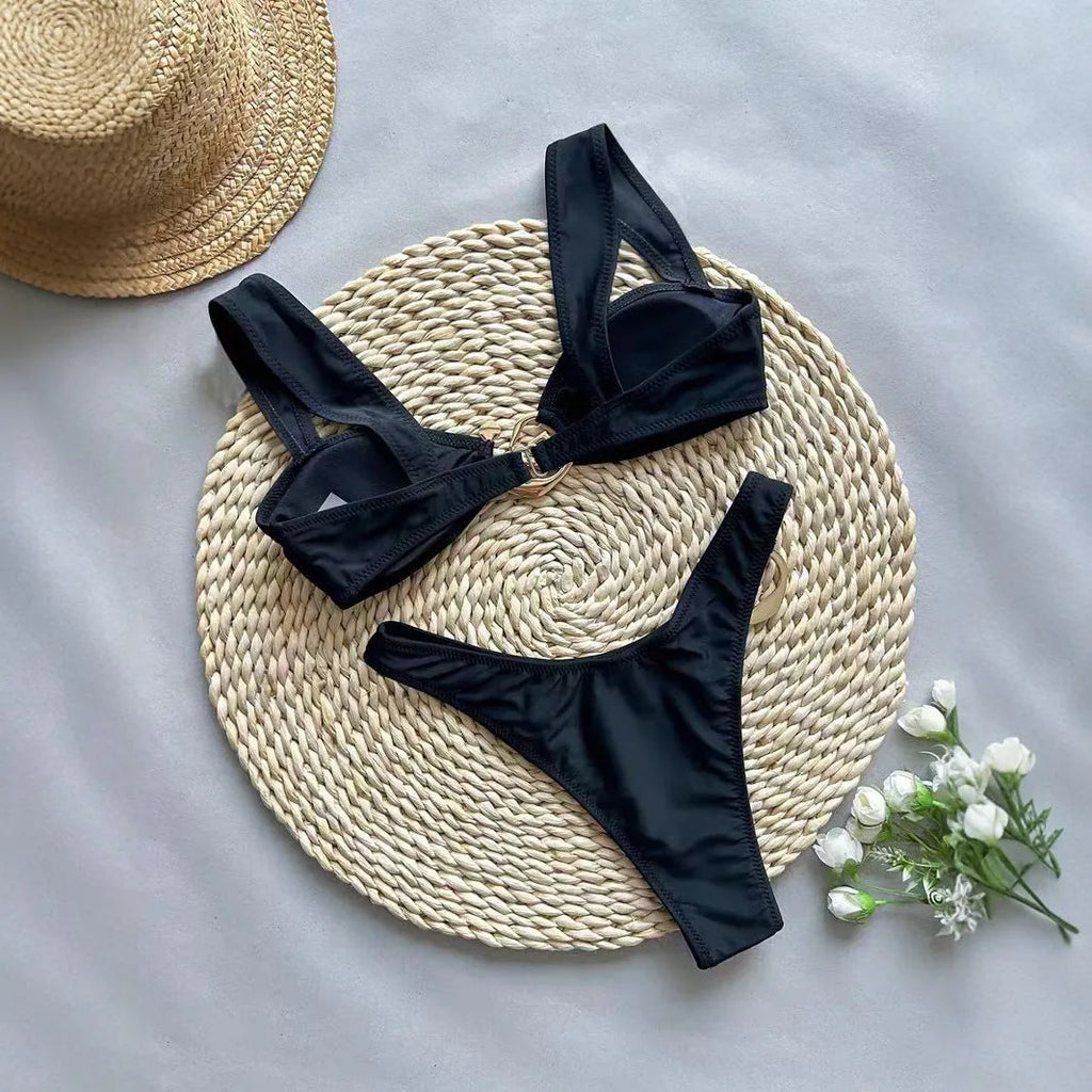 Women's black printed nylon bikini set in sexy style, two piece swimsuit on model