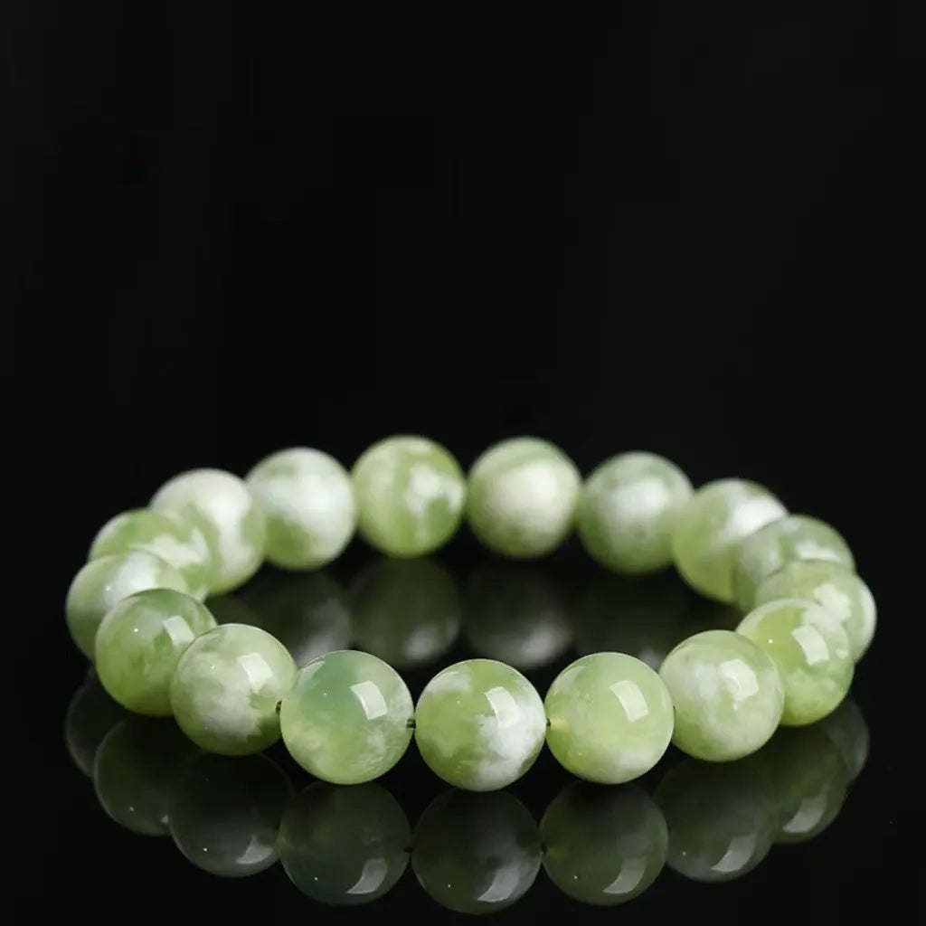 Green milk-in-water Xiuyan jade bracelet with geometric beads and polished finish