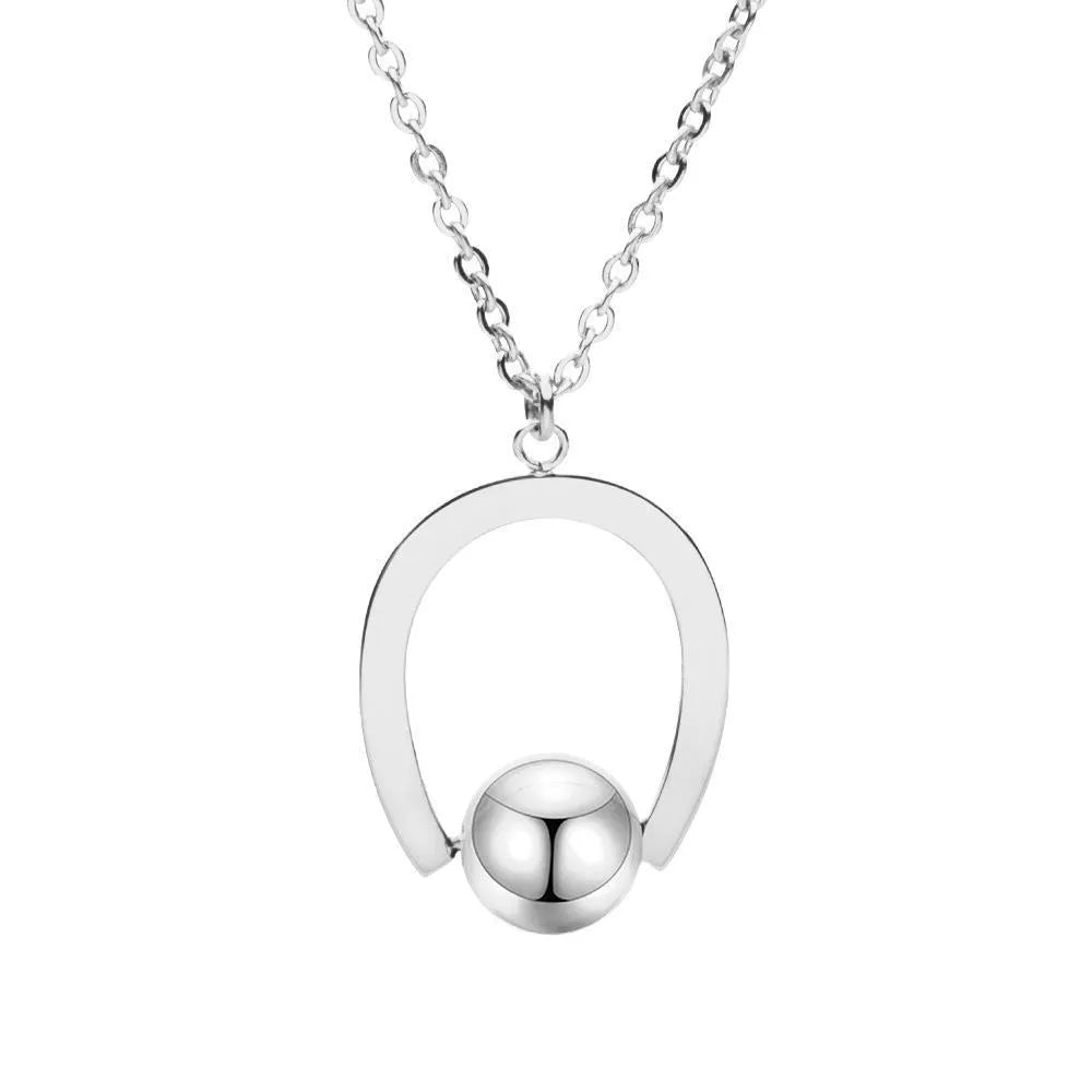 Adjustable stainless steel necklace with geometric pendant on a cross chain, shown in gold colour.