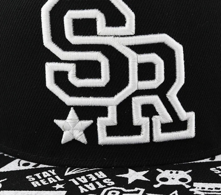 Black cotton baseball cap with white embroidered lettering on the front, showing adjustable back strap.