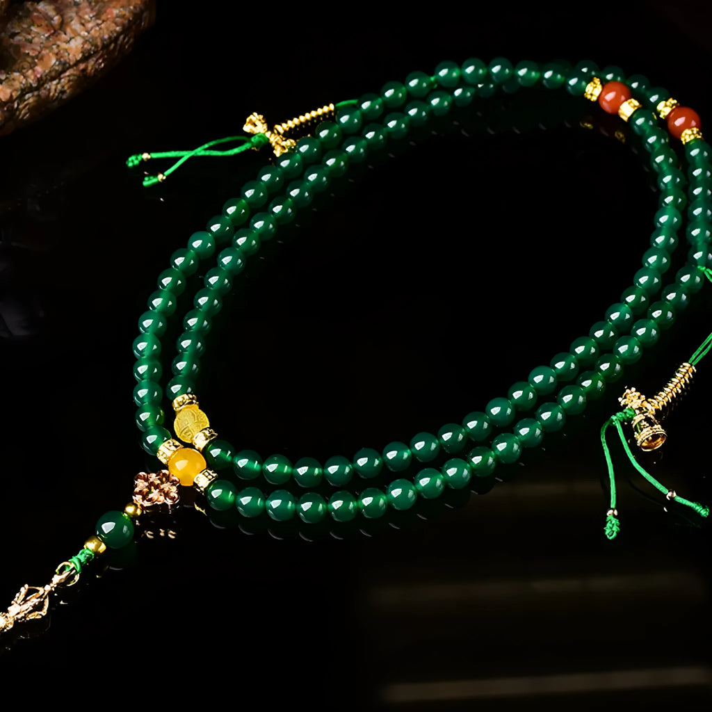 Natural green agate multi-circle bracelet for men and women on a wrist, showing different bead size options.