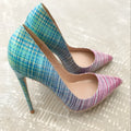 Pink and blue gradient patent leather ladies high heels with a pointed toe on a rubber sole.