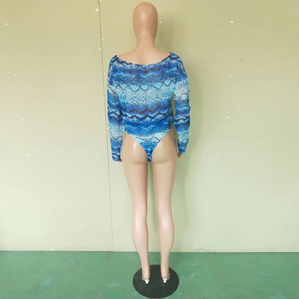 Women's snakeskin print three-piece bikini suit with long sleeve top and shorts in blue