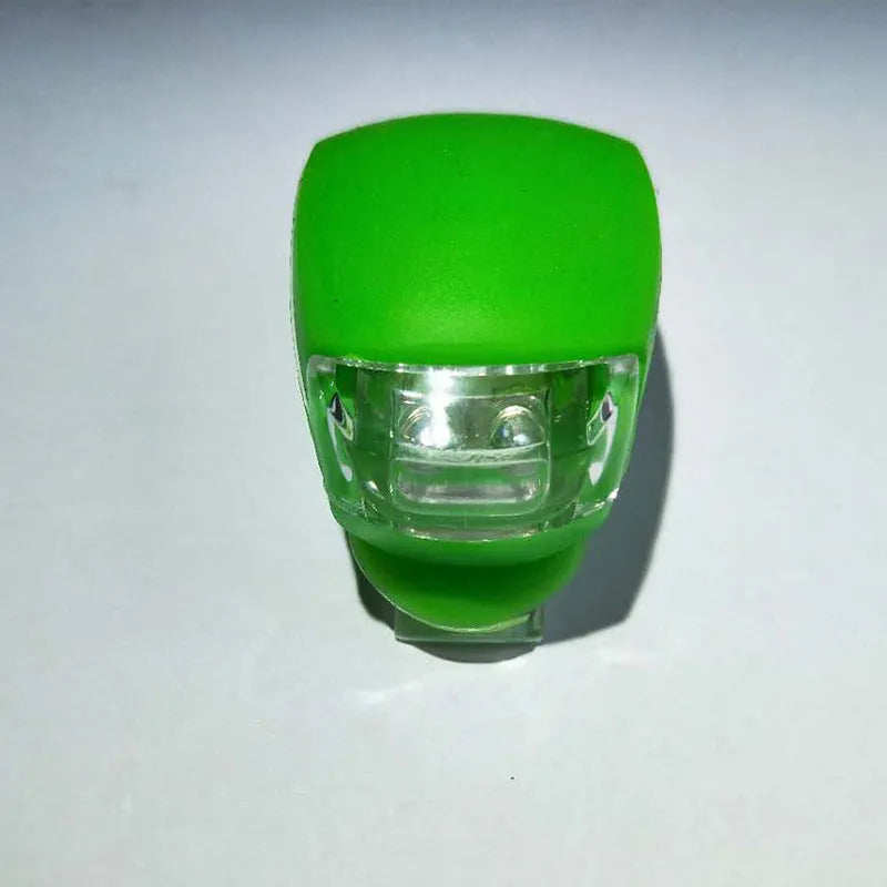 LED bike safety light with clip, flexible silicone body, and three light modes for cycling and outdoor use.