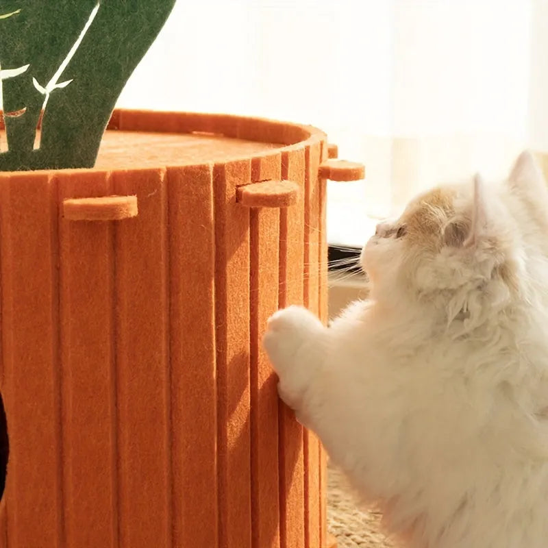 Carrot-shaped grey felt cat bed with a round tunnel entrance, shown next to a cat.
